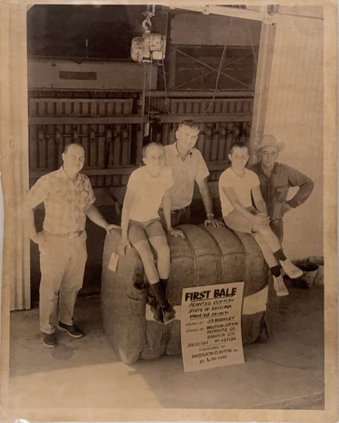 Members of the Barkley family with the season's first cotton bale at the Yuma gin